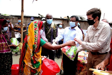 US Ambassador Earl Miller handover assistance to the flood-affected families in Gaibandha